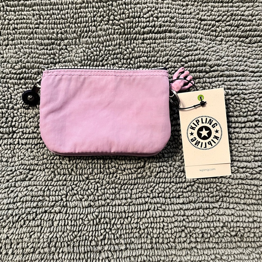 Kipling Small Creativity Wallet/Pouch - NWT
Color: Gentle Lilac - Picture 2 of 3